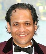 A photograph of Dinesh Sivaratnam.