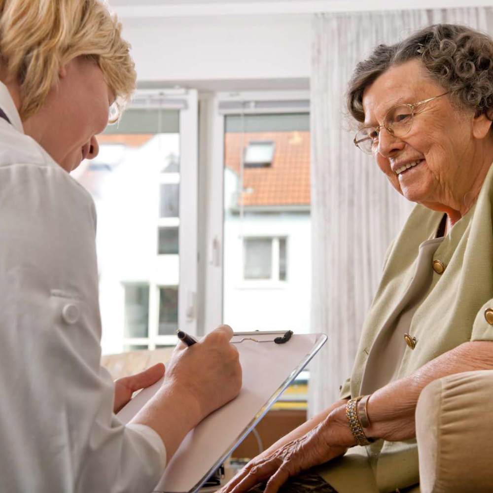 Geriatrician consulting with their patient