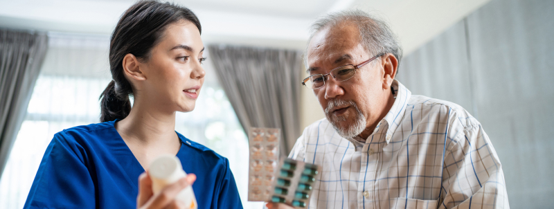 nurse-explaining-pills-patients