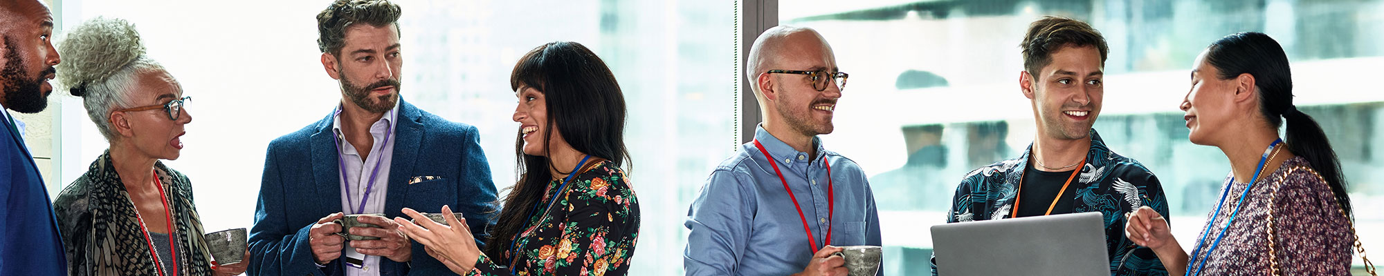 Portrait of a diverse group of business people standing together talking